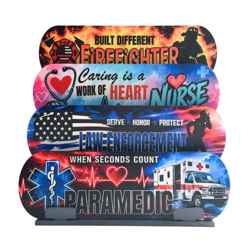 Four wooden shelf sitter signs displayed together featuring Firefighter, Nurse, Law Enforcement, and Paramedic designs, with the Paramedic sign on a stand.